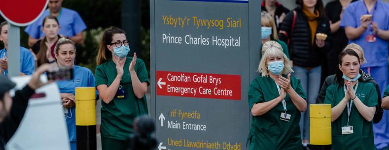 Staff from Prince Charles hospital participating in the weekly clap for key workers during the pandemic