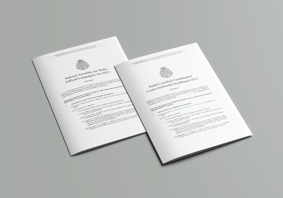 The article’s main image is of English and Welsh versions of the National Assembly for Wales (Official Languages) Act 2012.