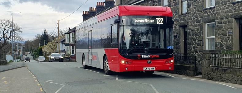 Picture of the T22 Trawscymru bus service passing through a village