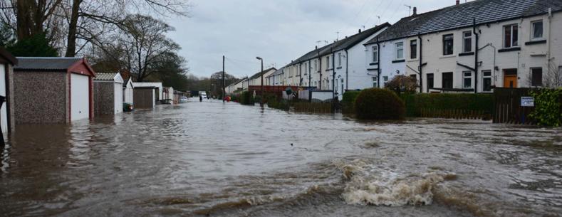 Flooded row of houses and garages