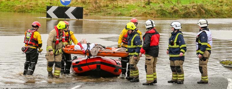 People getting rescued by the fire service