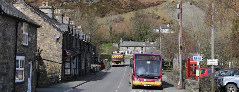 A bus passing through Llangynog in Powys