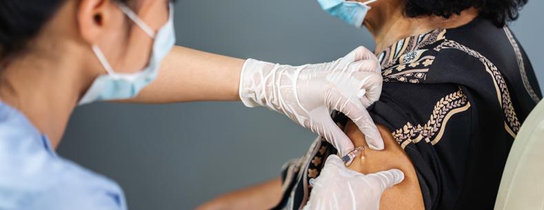 woman receiving vaccine