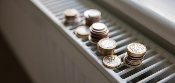 £1 coins on a radiator