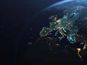 The main photo is a satellite image of EU Member State countries lit up at night. 