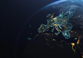 The main photo is a satellite image of EU Member State countries lit up at night. 