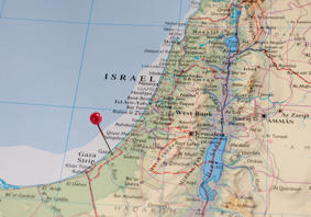 The article’s main image shows a coloured map of Israel and Gaza.