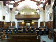 A picture showing the inside of an empty court room