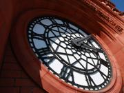 The article’s main image is of the Senedd’s red brick Pierhead clock with blue sky behind on a sunny day