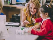 Teacher  with a pupil 