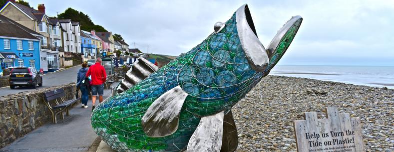 Bertie the seabass, a metal sculpture filled with plastic waste from the beach at Amroth Pembrokeshire as part of anti-plastic pollution of seas campaign