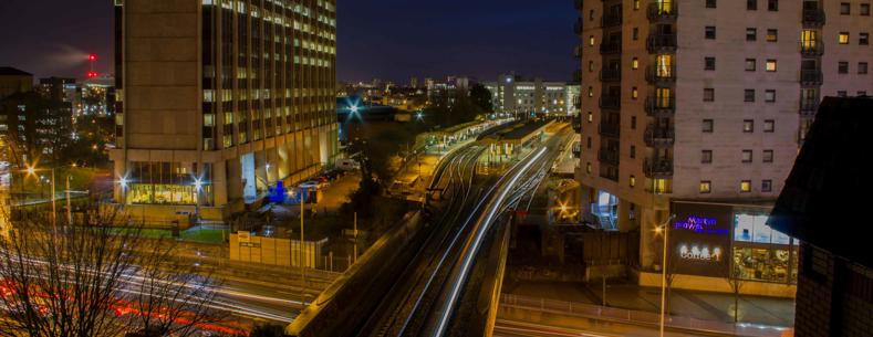 A photograph looking down on Cardiff Central Railway Station at night