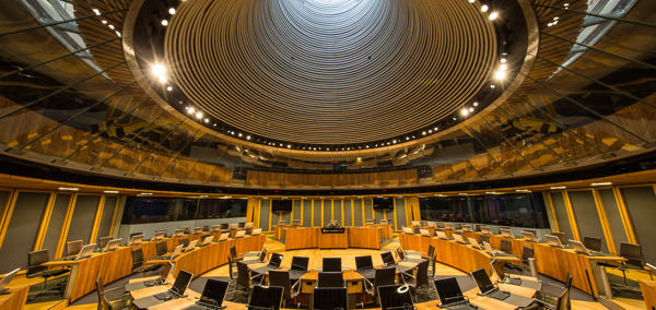The Senedd chamber from inside looking up to the light outside.
