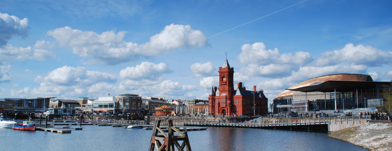 Image of Cardiff Bay, showing the Senedd building and the Pierhead. 
