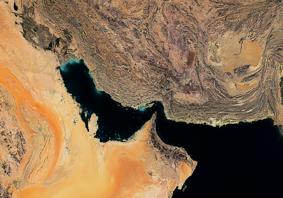 The article's main image is a colour satellite image of the Strait of Hormuz