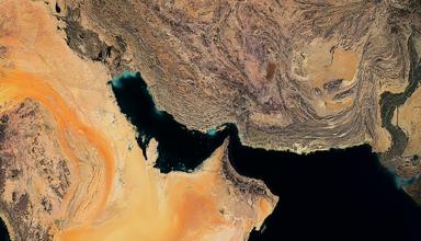 The article's main image is a colour satellite image of the Strait of Hormuz