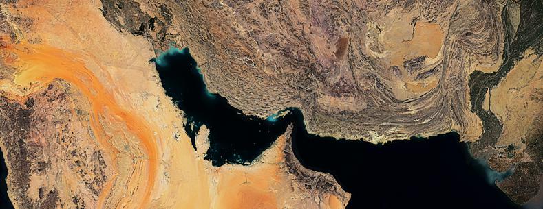The article's main image is a colour satellite image of the Strait of Hormuz