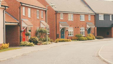 Image of a row of red-brick houses on an estate