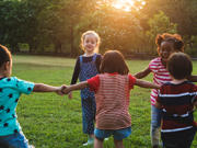 Children holding hand in a circle