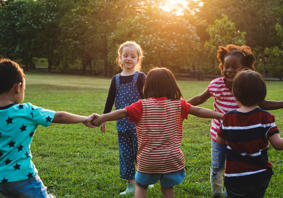 Children holding hand in a circle