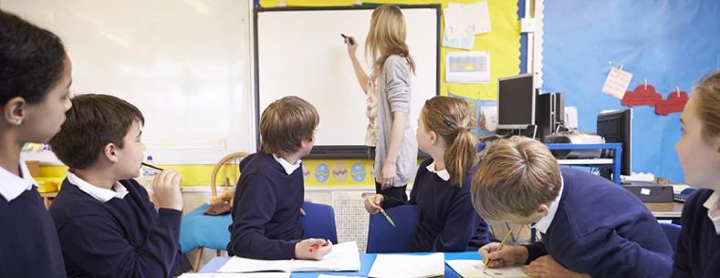 teacher teaching in classroom
